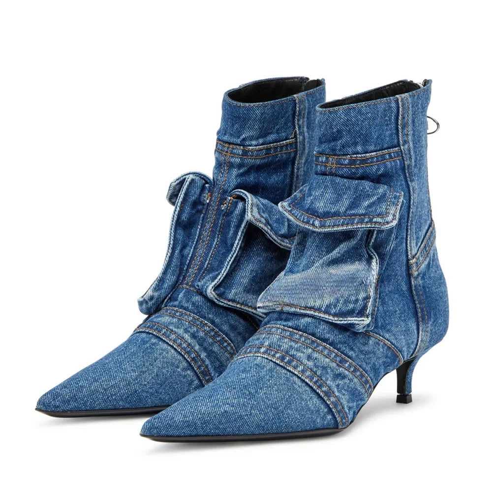 Blue denim high-heeled boots with a bow on a white background
