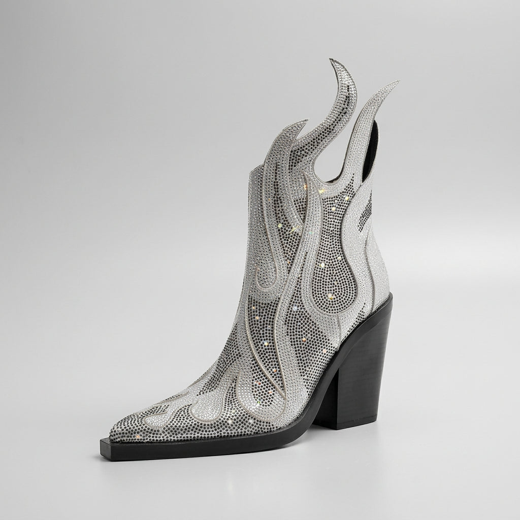 Black and white boot with flame design on a white background