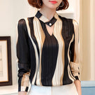 Turning Tables Stripped V-Neck Blouse